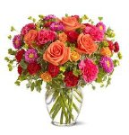 Bouquet di fiori colorati con vaso